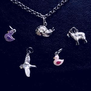 Silver duck, snail or goat charms