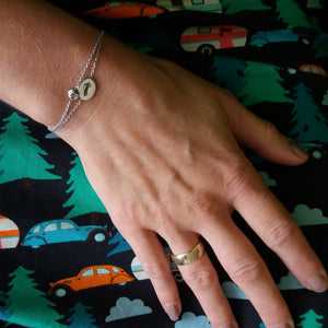 Silhouette bracelet and gearshift pattern bracelet