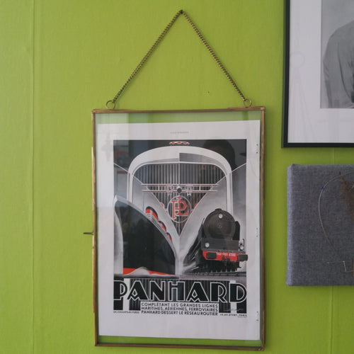 Glass and brass frame for posters