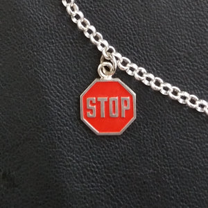 Silver stop sign charm with enamel