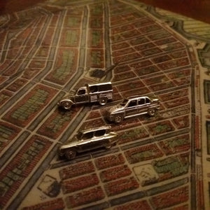 Tie clip or pin with car