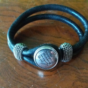 Leather bracelet with gearshift button