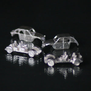 Silver miniature 2cv 4 or 6 with passengers